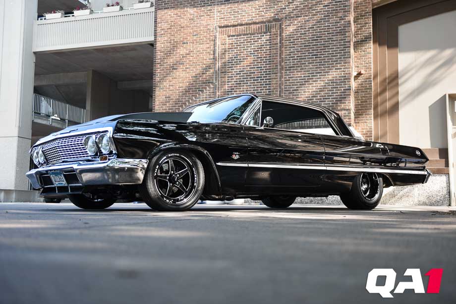 Black 1963 Chevrolet Impala with a big block Chevy engine and QA1 coilover suspension. Black 1963 Chevrolet Impala with a big block Chevy engine and QA1 coilover suspension.