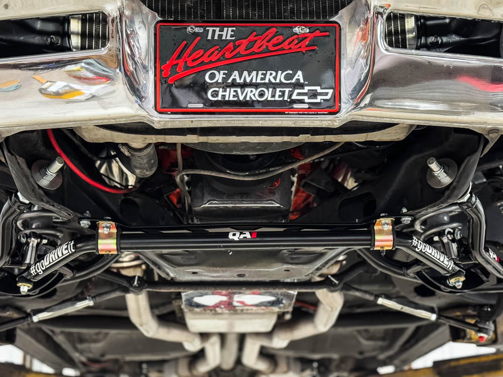 QA1 sway bar and drop spindles in the front suspension, demonstrating the car’s precise handling setup. QA1 sway bar and drop spindles in the front suspension, demonstrating the car’s precise handling setup.