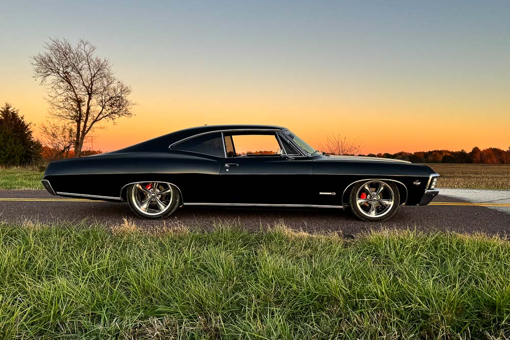Side profile of the 1967 Impala SS with its lowered stance and 20-inch rear wheels. Side profile of the 1967 Impala SS with its lowered stance and 20-inch rear wheels.