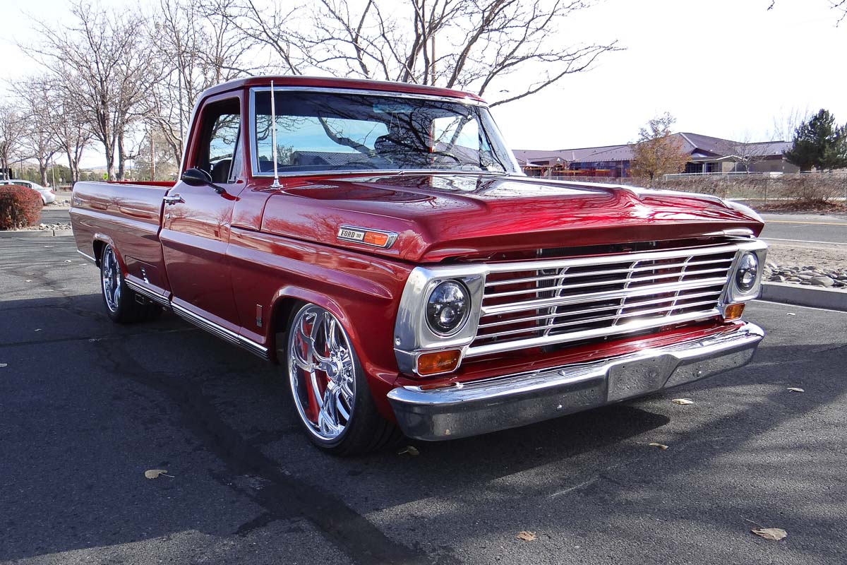 Front three-quarter view of Steve and Yelena Price’s 1968 Ford F100 Ranger, Ginger, painted in Rapid Red Metallic. Front three-quarter view of Steve and Yelena Price’s 1968 Ford F100 Ranger, Ginger, painted in Rapid Red Metallic.