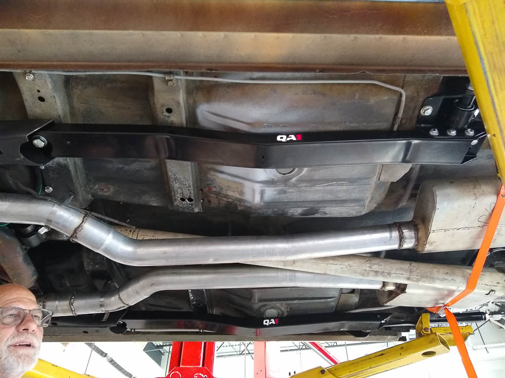 Tubular subframe connectors reinforcing a Chevrolet Nova’s chassis to improve handling and reduce body flex during acceleration. Tubular subframe connectors reinforcing a Chevrolet Nova’s chassis to improve handling and reduce body flex during acceleration.