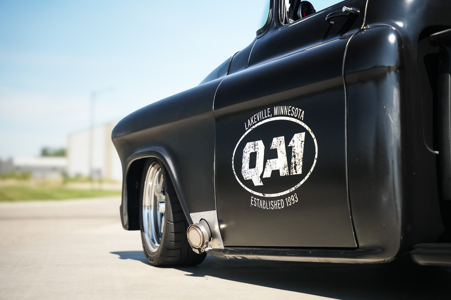 Rear view of Rob McPherson’s 1956 Chevy 3100, showcasing the custom 4-link suspension and wide rear tires. Rear view of Rob McPherson’s 1956 Chevy 3100, showcasing the custom 4-link suspension and wide rear tires.