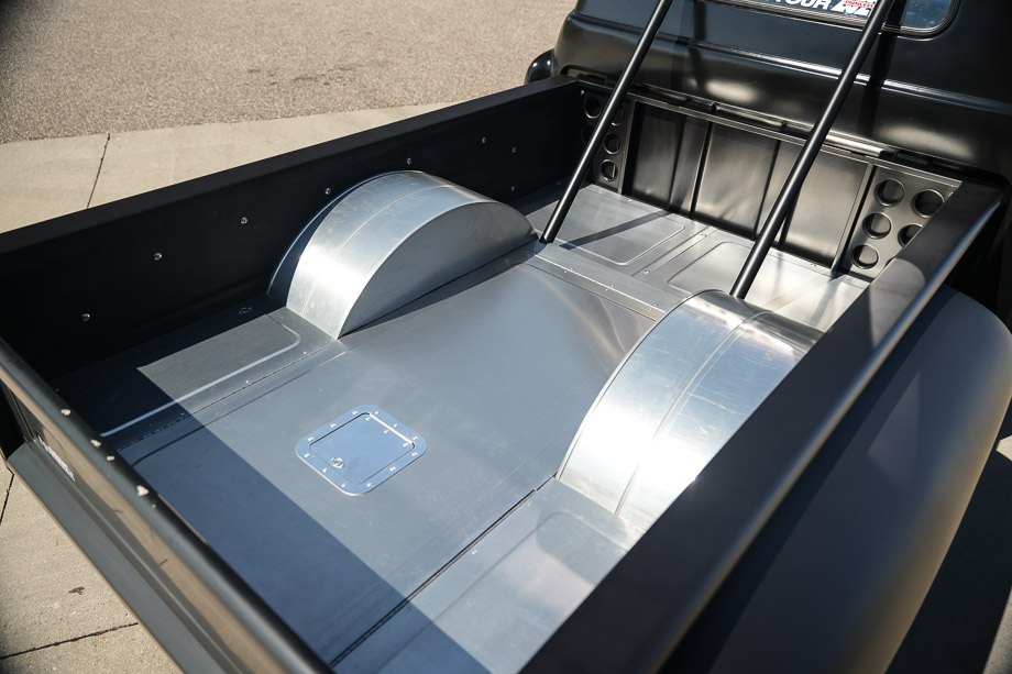 The custom bead-rolled aluminum bed floor of the 1956 Chevy 3100 with center access door. The custom bead-rolled aluminum bed floor of the 1956 Chevy 3100 with center access door.